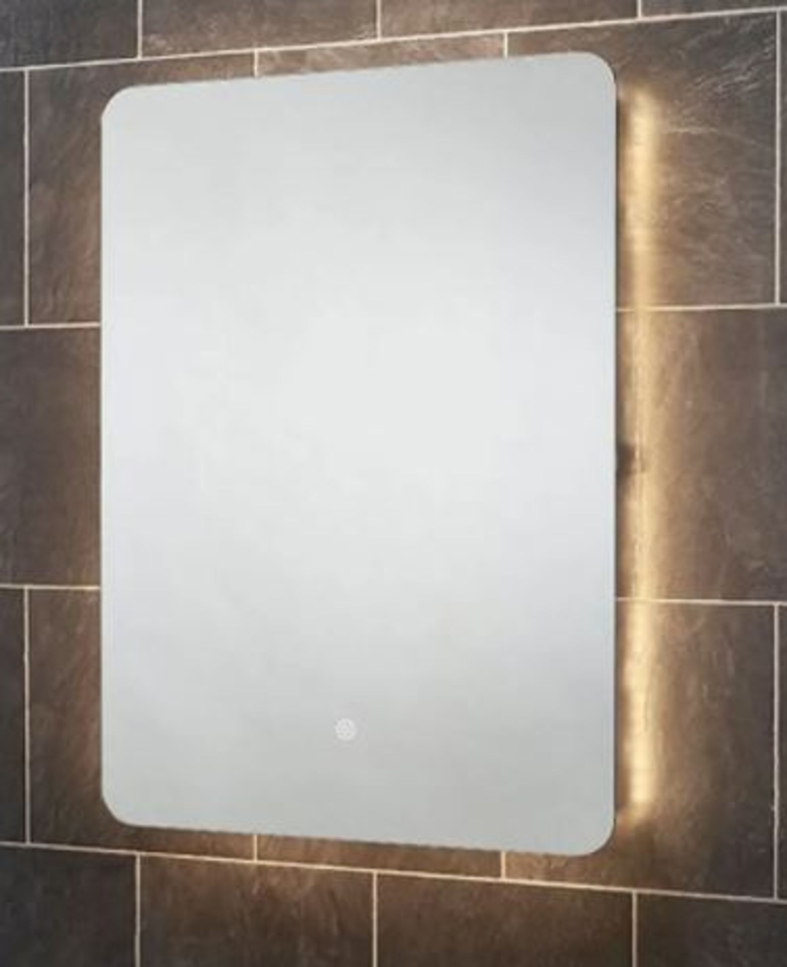 RRP £225. Rhea Backlit LED Mirror With Demister 600x800mm. Appears New / Sealed. SKU: 555860. The e