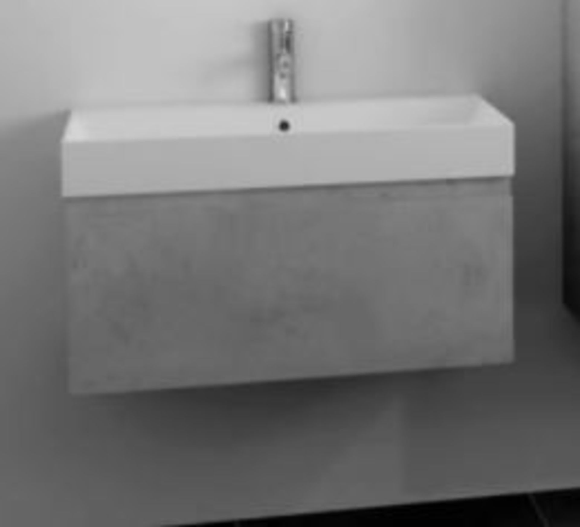 RRP £200. Mino 600mm Wall Mounted Vanity Unit – Concrete. Unit only. Appears New unused