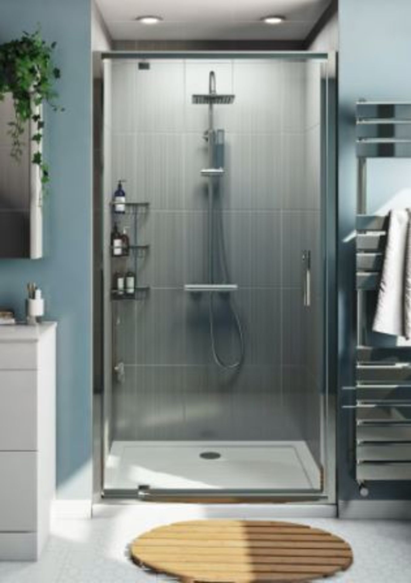 RRP £249. Orchard 6mm pivot hinged glass shower door with silver frame 1850. Appears unused.