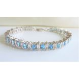 Sterling Silver 16ct Blue and White Topaz Bracelet New with Gift Box