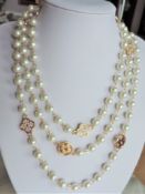 60 inch Pearl and Crystal Charm Necklace
