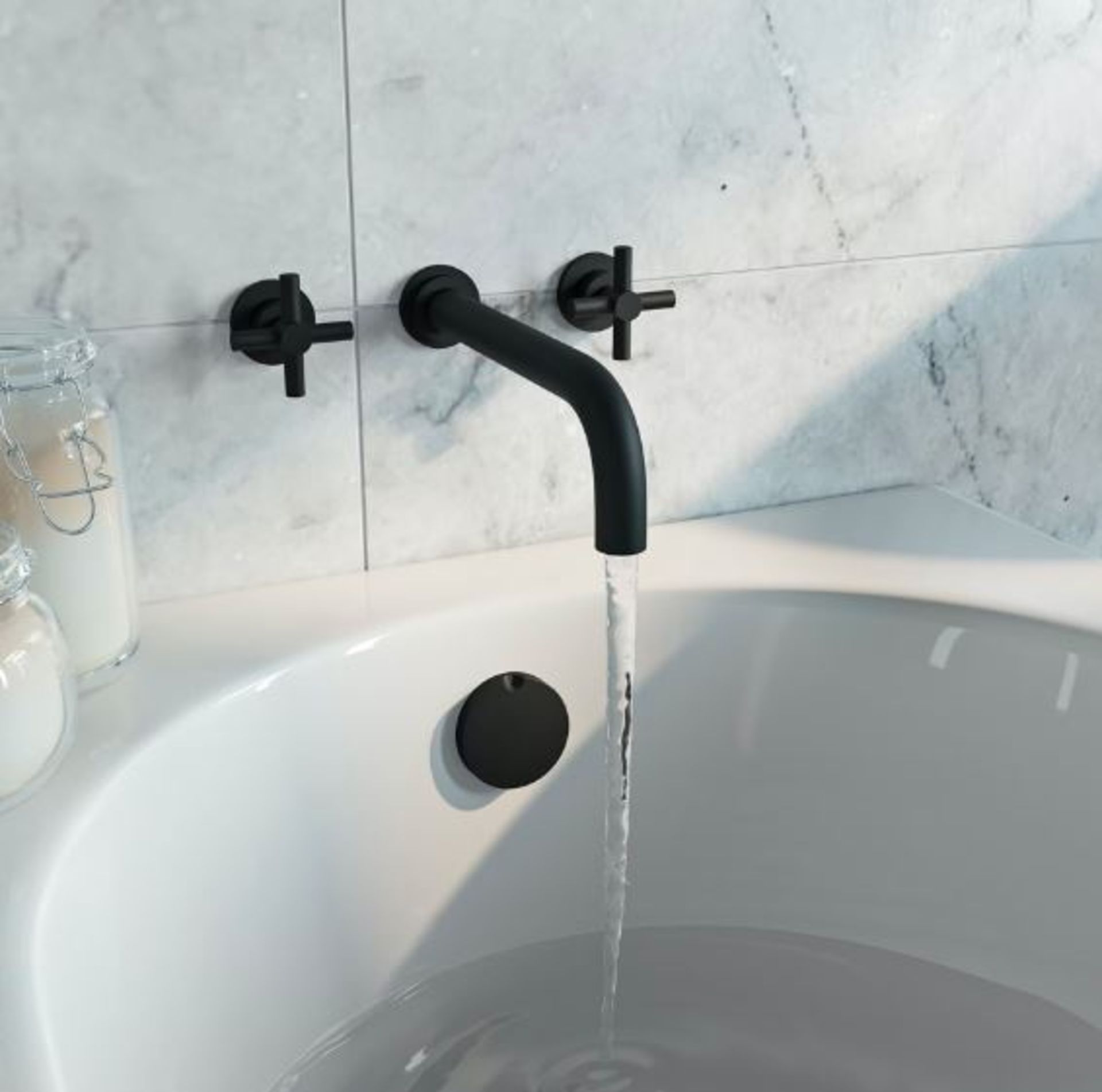 RRP £119. Mode Tate black wall mounted bath mixer tap.