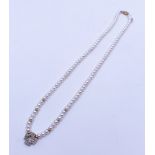 Diamond Cross on Pearl Necklace