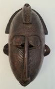 African Sculpture Wooden Tribal Mask. Ethnographic Art.