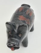 Antique Carved Stone Pig with harlequin pattern on back