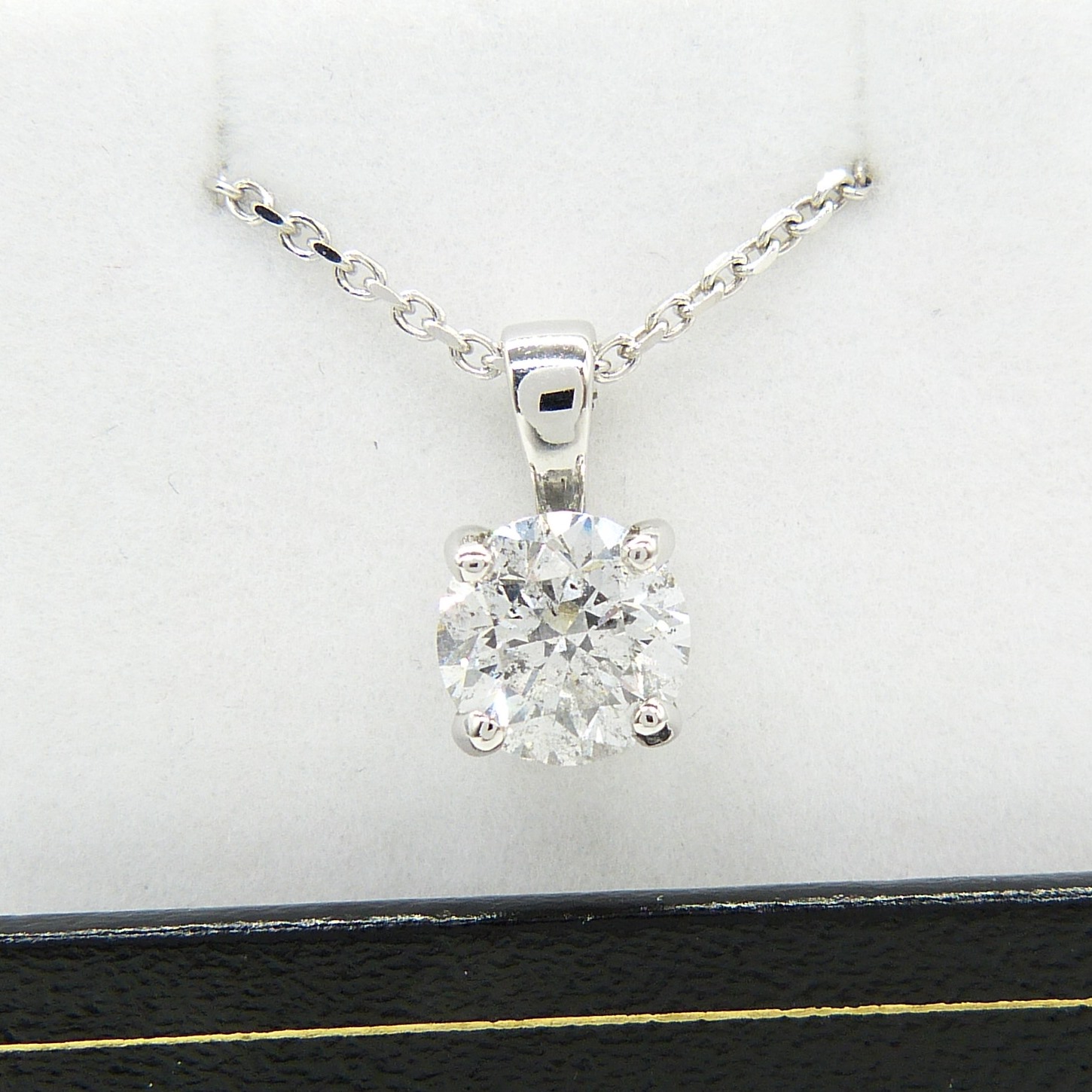 Certificated 1.24 carat, E colour round brilliant-cut diamond solitaire necklace, 18ct white gold