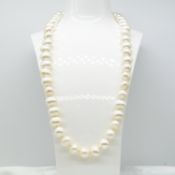 String of white freshwater cultured pearls with 9ct yellow gold ball clasp