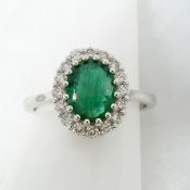 18ct white gold oval emerald and diamond cluster ring