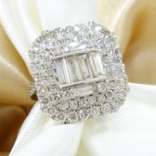 Large continental-style 2.75 carat round brilliant-cut and baguette diamond cluster ring, white g...