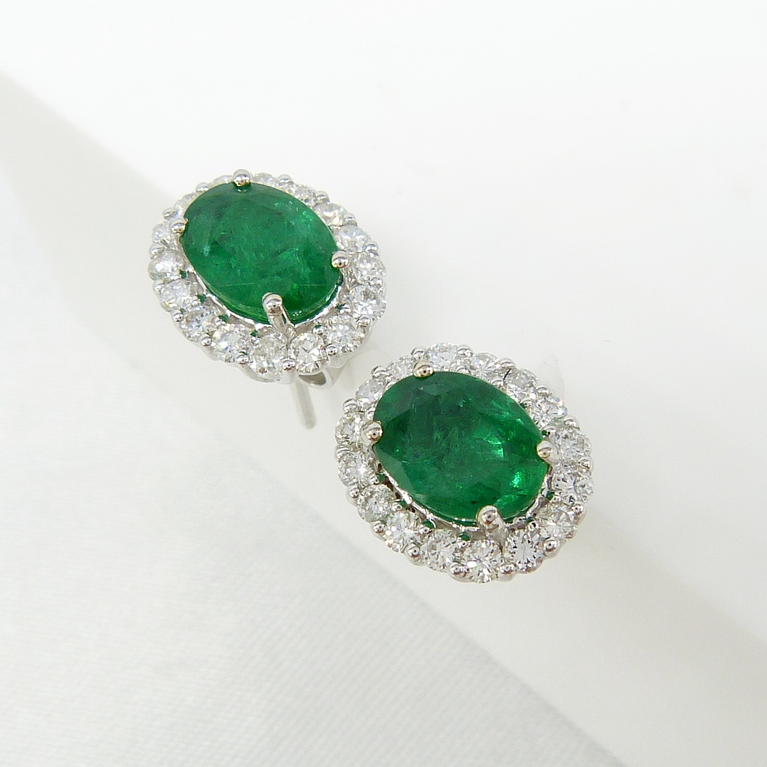 Pair of 18ct white gold 2.48 carat emerald and diamond halo ear studs, boxed - Image 8 of 8