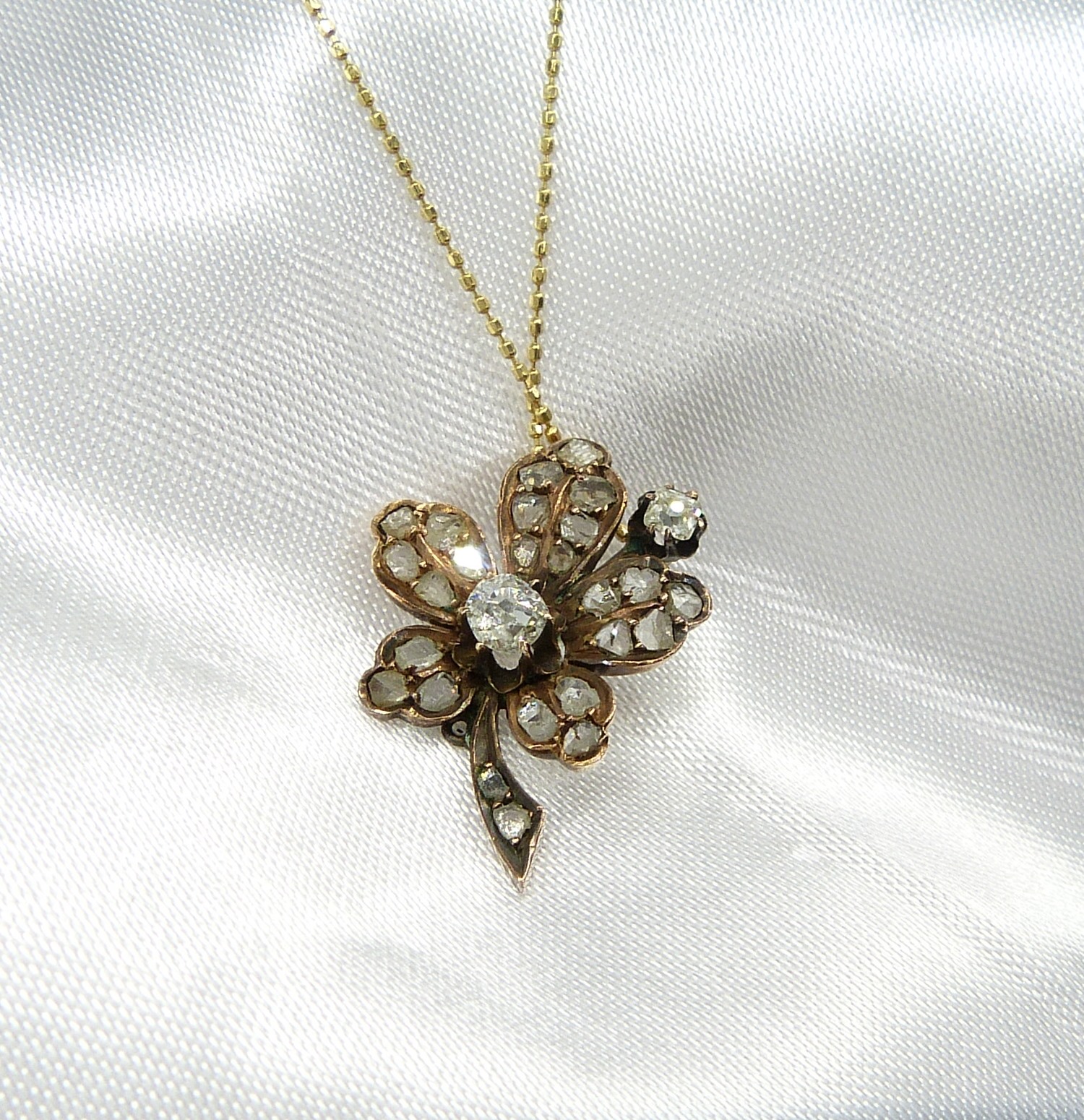 Antique old-cut and rose-cut diamond set flower pendant and chain, 14ct gold
