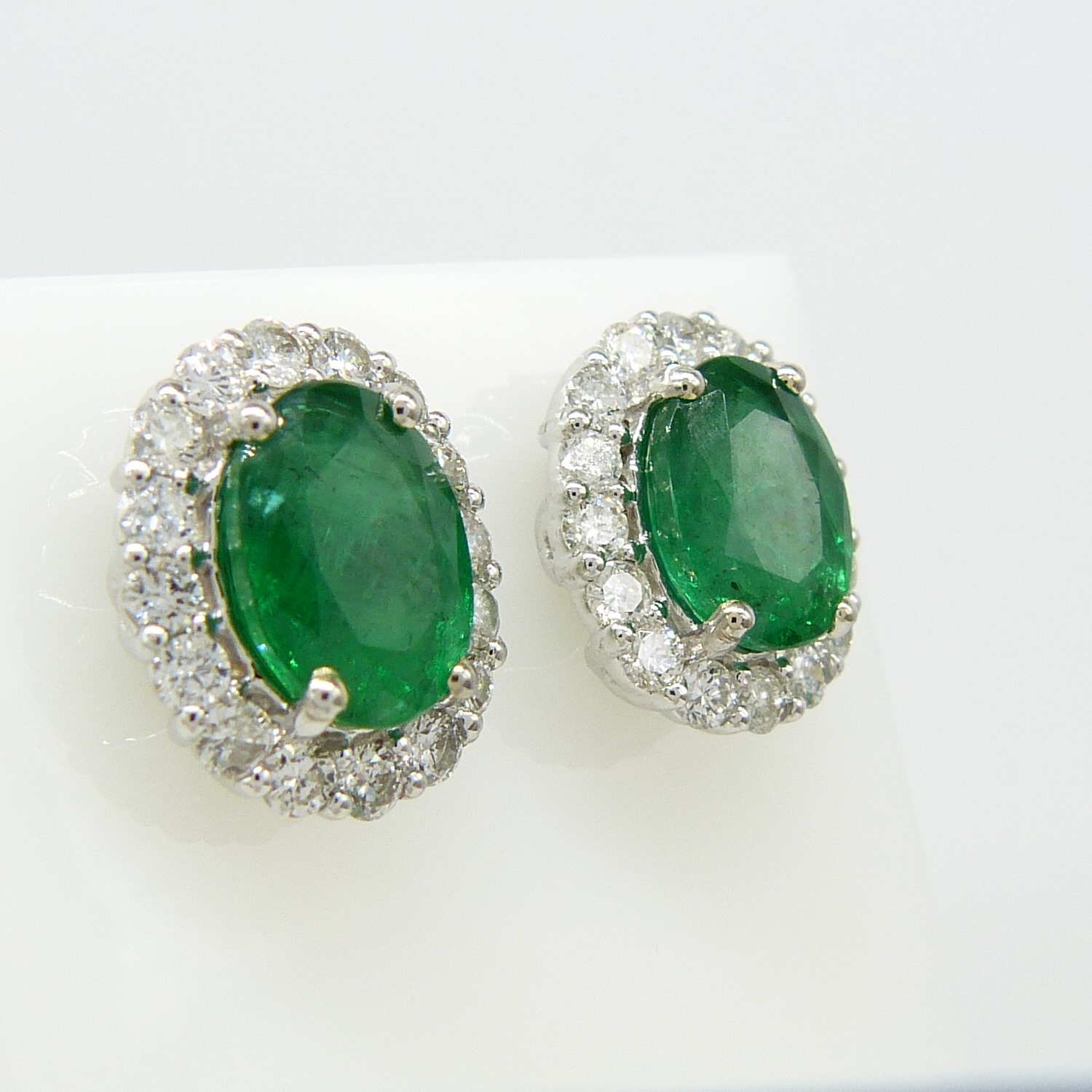Pair of 18ct white gold 2.48 carat emerald and diamond halo ear studs, boxed - Image 4 of 8