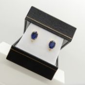 Pair of 3.00 carat sapphire and diamond ear studs, boxed