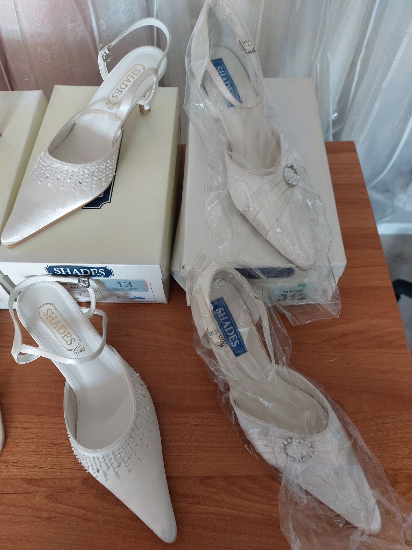 4 Pairs Ivory Shoes