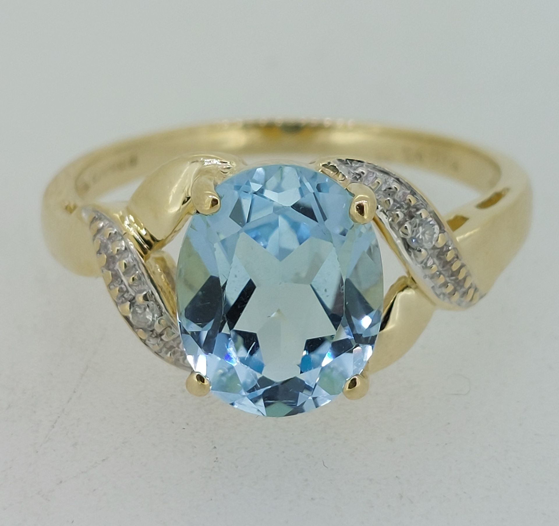 9ct Yellow Gold (375) Blue Topaz & Diamond Dress Ring