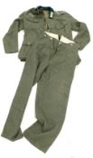 A film prop woolen jacket and trousers, from Band of Brothers, marked Wardrobe Issued and numbere...