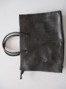 Ladies black leather tote as pictured has some marks , previous use -