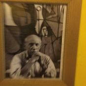 A Framed Photograph of Pablo Picasso In His Studio Sat Opposite His Painting of La Cuisine In 194...