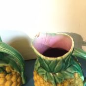 A Graduated Pair of Majolica Pineapple Jugs