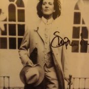 A Photograph of Stephen Fry Signed Dressed In Character As Oscar Wilde