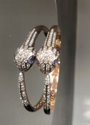 Beautiful Natural Diamond and Tanzanite snake bracelet with 18k rose gold