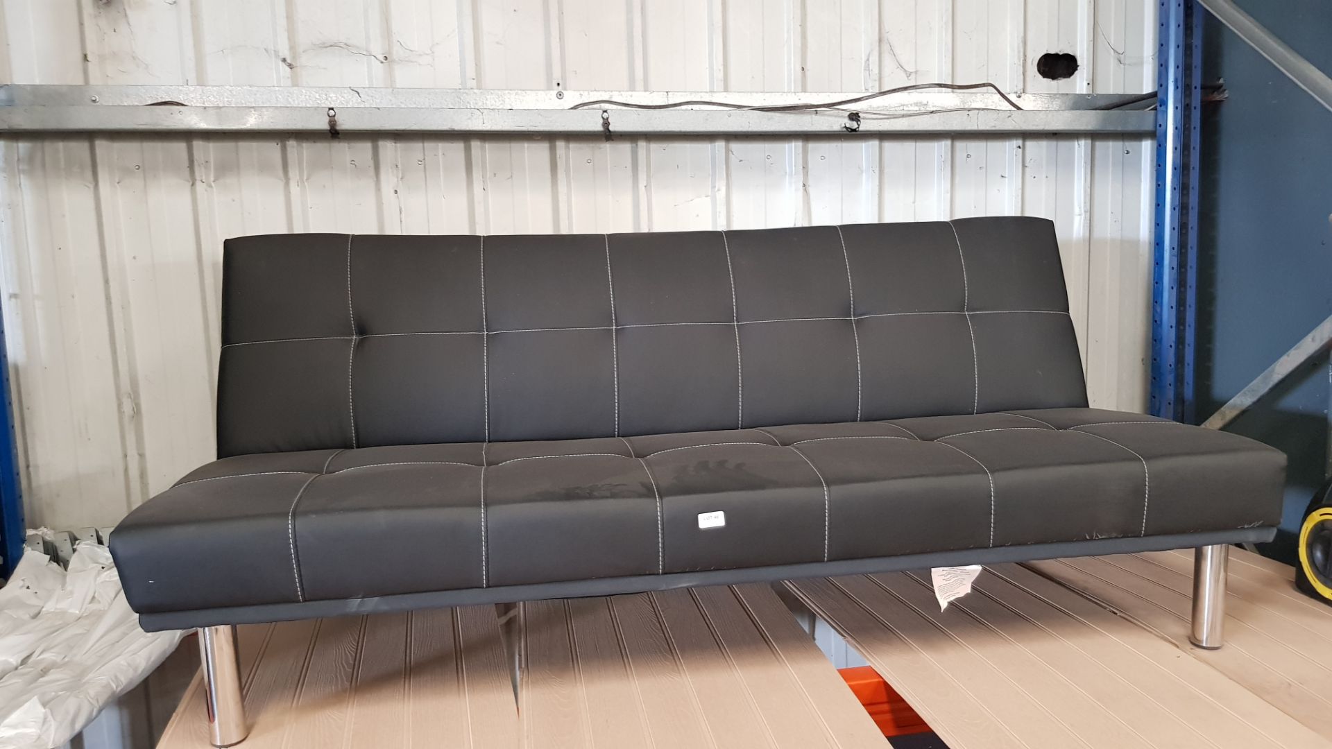 (46/R3) RRP £299. Clik Clak Faux Leather Sofa Bed Black/Chrome. Sofa: (W182x D92x H76cm). Sofa bed..