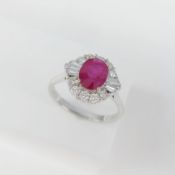 A Stunning 18Ct White Gold Ruby And Diamond Halo Cocktail / Dress Ring