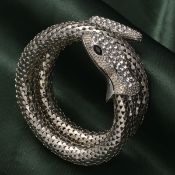 New! White Austrian Crystal and Simulated Black Spinel Snake Bracelet in Silver