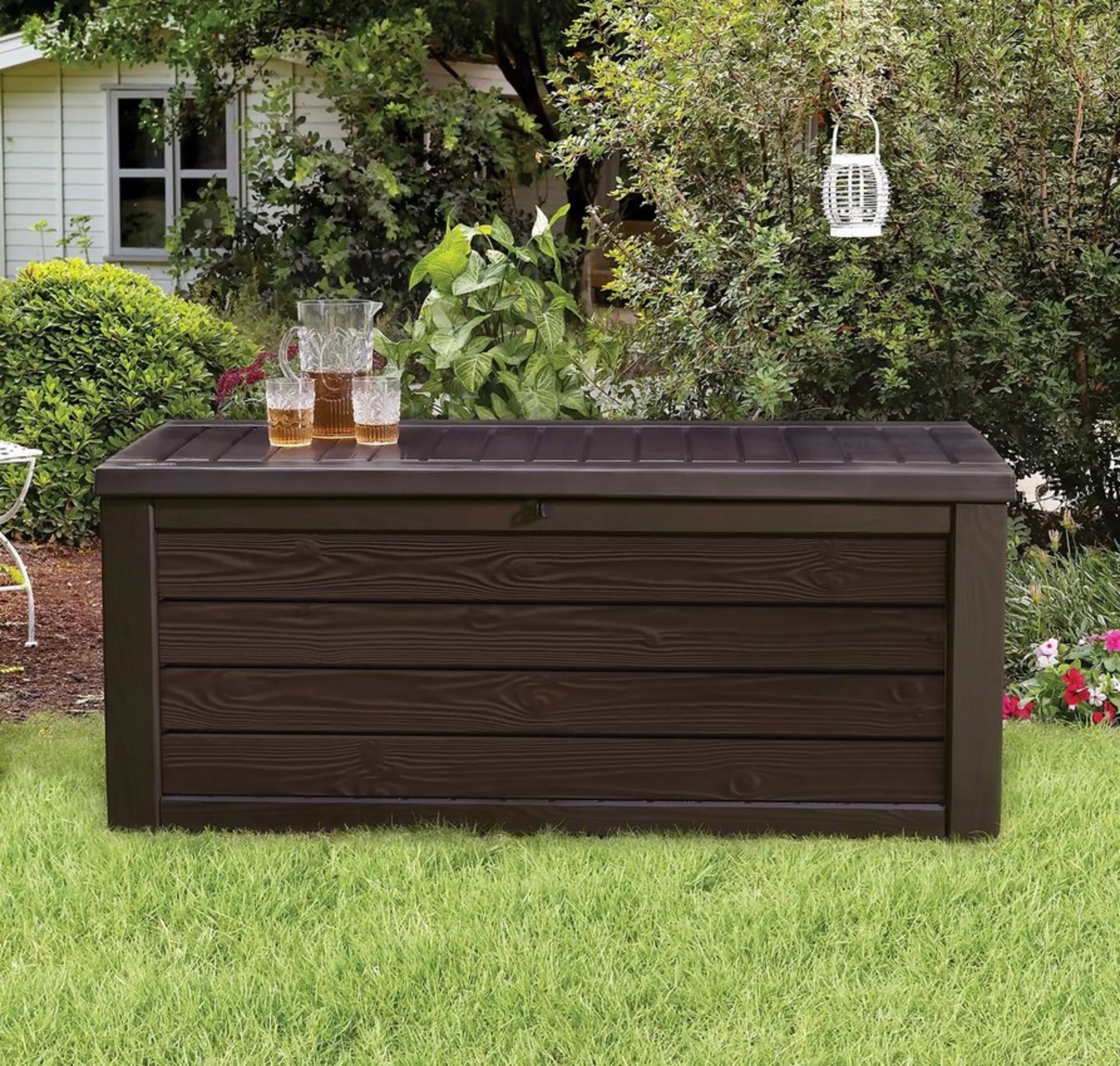 (18/Mez/P11) RRP £170. Keter Westwood Outdoor Garden Storage Box Brown. 570L Capacity. Decorative...