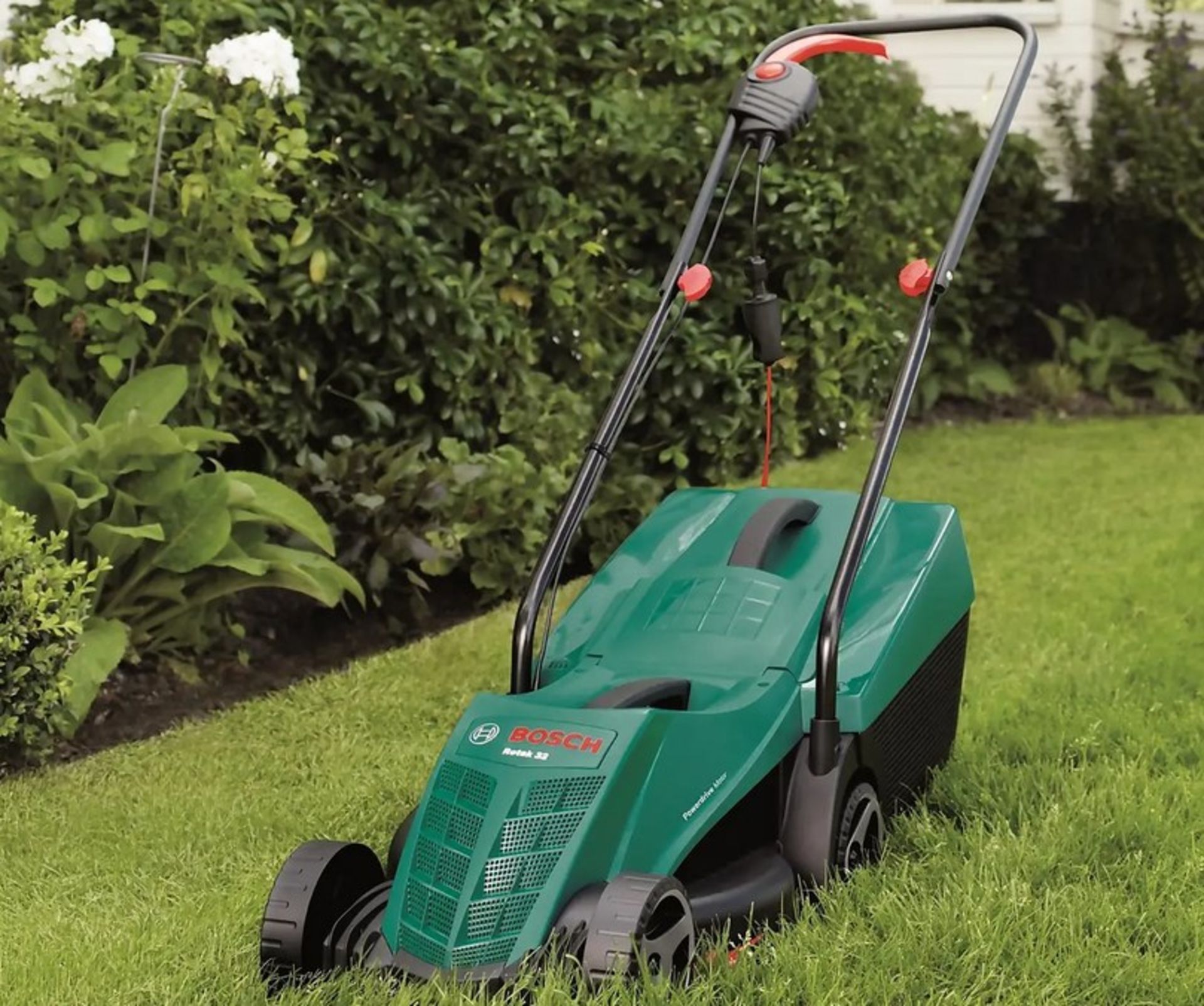 (47/Mez/P7) Lot RRP £184. 2x Items. 1x Bosch Rotak 32-12 Corded Lawn Mower RRP £85. 1x Powerbase...