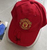 Signed 'Dennis Irwin' Manchester United official merchandise cap with secure case and photo COA