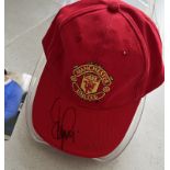 Signed 'Dennis Irwin' Manchester United official merchandise cap with secure case and photo COA