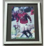 Signed framed image of 'Ole Gunnar Solskjaer' playing for Manchester United Football Club with CO...