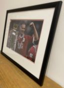 Signed framed image of 'Rio Ferdinand' playing for Manchester United Football Club with COA