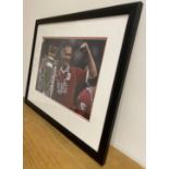 Signed framed image of 'Rio Ferdinand' playing for Manchester United Football Club with COA