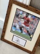 Signed framed image of 'Paul Pogba' playing for Manchester United Football Club with COA