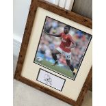 Signed framed image of 'Paul Pogba' playing for Manchester United Football Club with COA