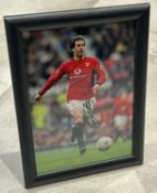 Signed framed image of 'Ruud Van Nistelrooy' playing for Manchester United Football Club with COA