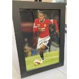 Signed framed image of 'Antonio Valencia' playing for Manchester United Football Club with COA