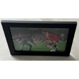 Signed framed image of 'Ole Gunnar Solskjaer' playing for Manchester United Football Club with CO...