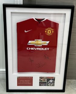 Manchester United legends shirt display signed by ‘Charlton’, ‘Irwin’ and ‘Robson’, framed with C...