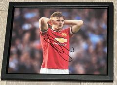 Signed framed image of 'Luke Shaw' playing for Manchester United Football Club with COA