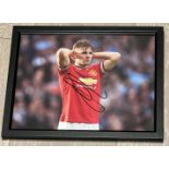 Signed framed image of 'Luke Shaw' playing for Manchester United Football Club with COA