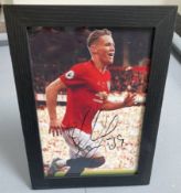 Signed framed image of 'Scott McTominay' playing for Manchester United Football Club with COA