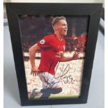 Signed framed image of 'Scott McTominay' playing for Manchester United Football Club with COA