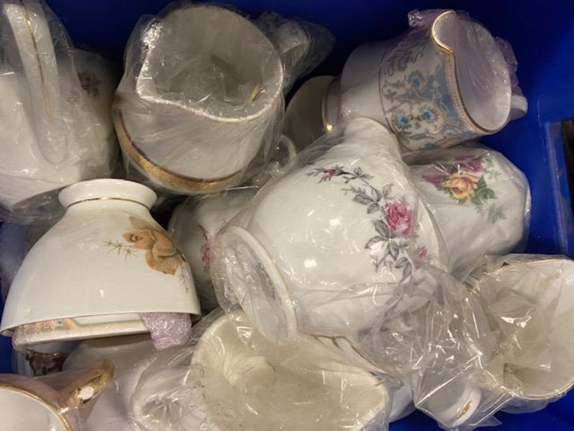 Lot 34. Assorted Patterned Cream and Sugar Bowls