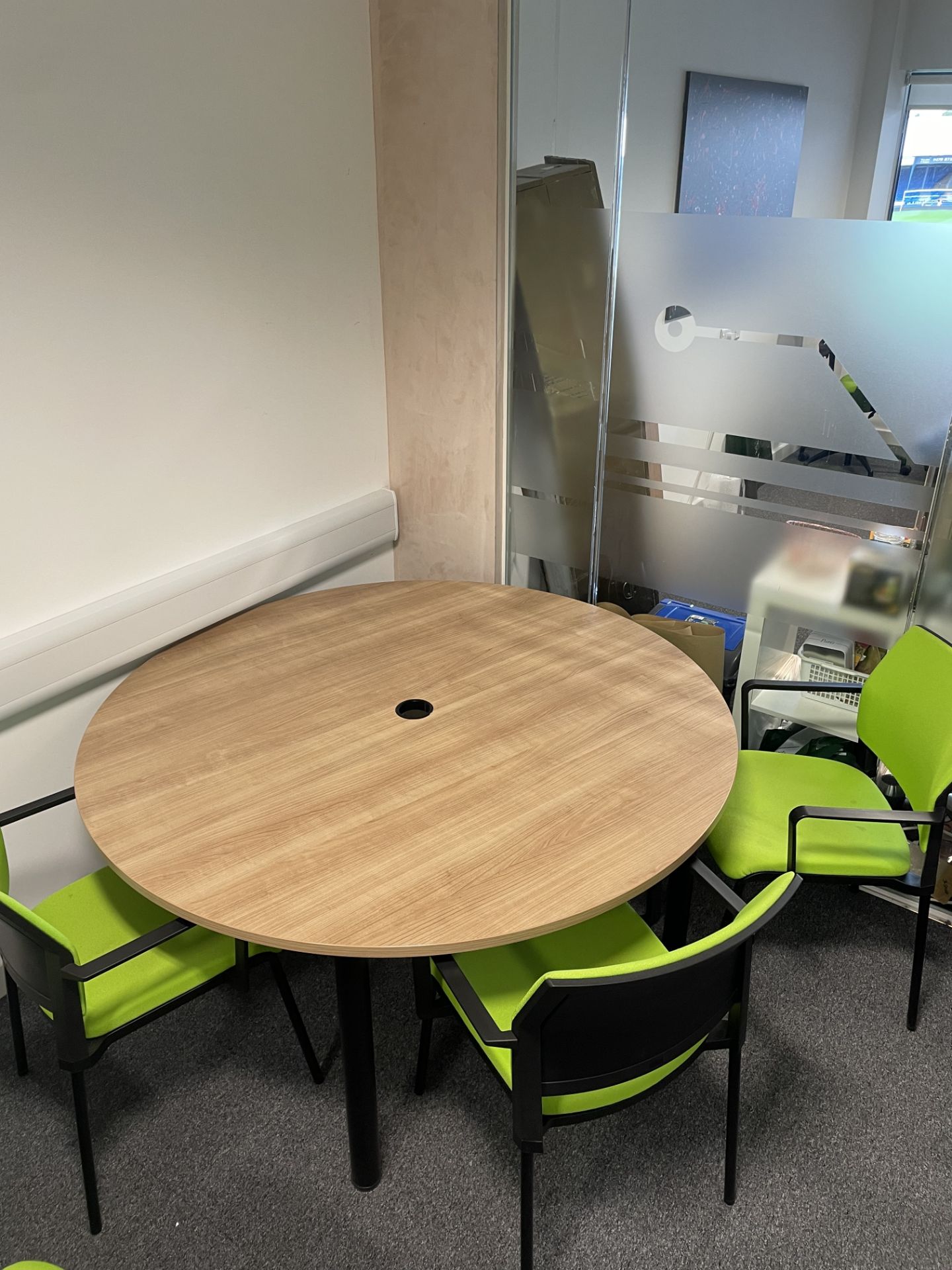 1 x round office table with 5 x green fabric chairs