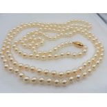 48 Inch Opera Length Single Strand Pearl Necklace