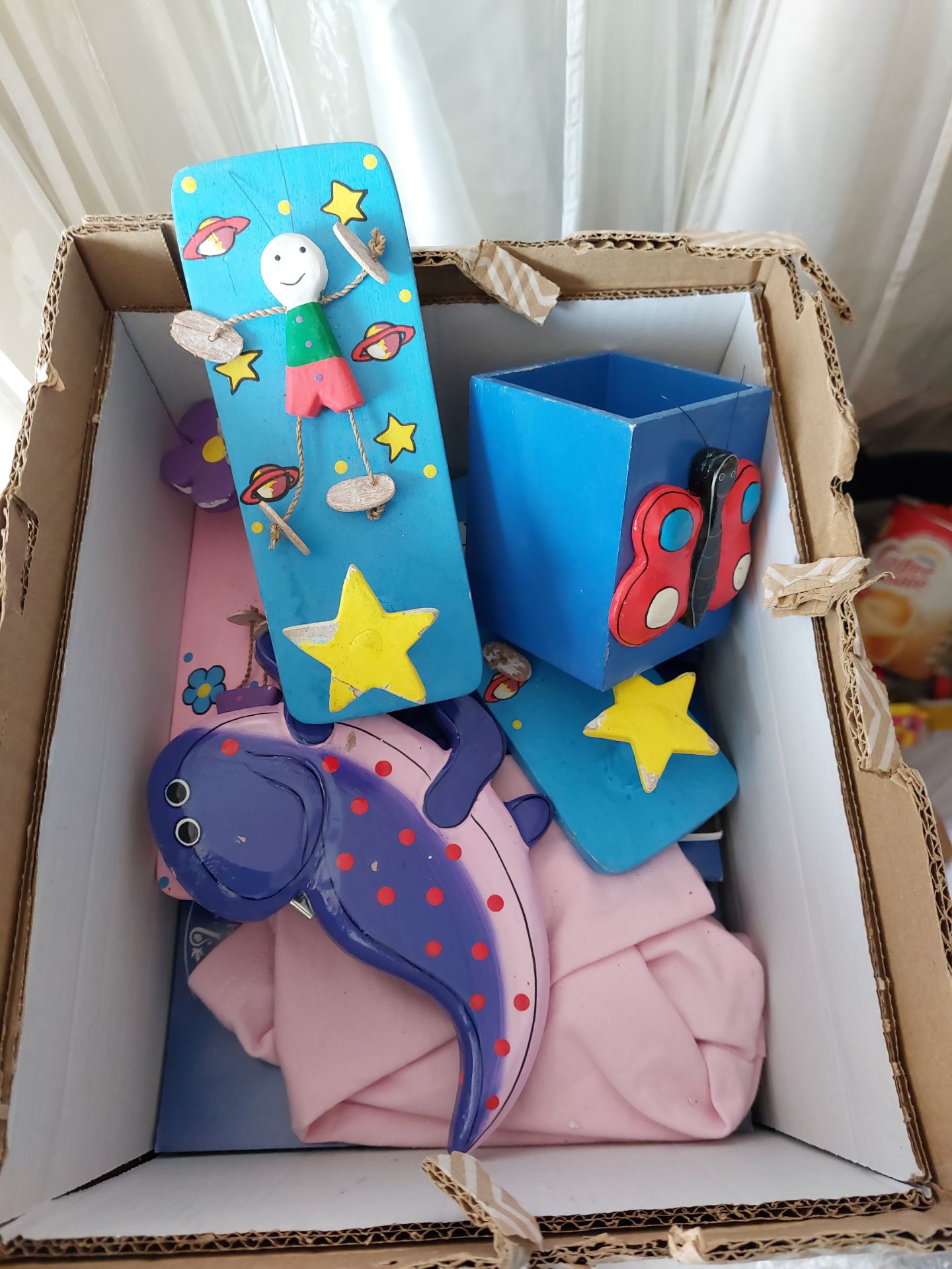 Box of Pink and Blue Door and Clothes Hooks and Mirrors for Children's Rooms