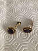 Pair of earrings 18 karat gold with amethyst stones